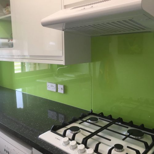 green kitchen with back worktops