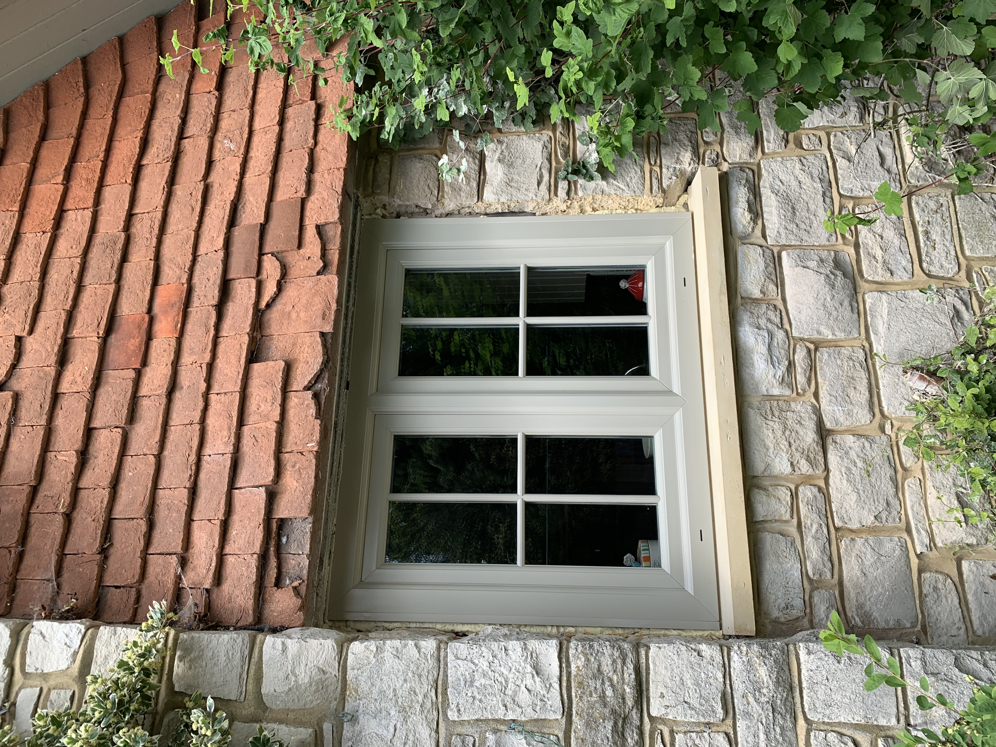 Pebble Grey casemeent window