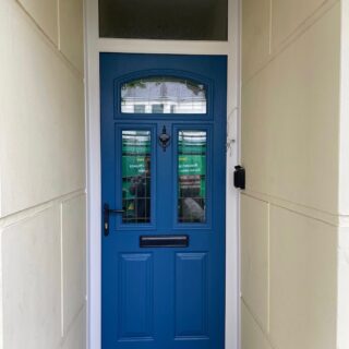 Blue comp door with black furniture